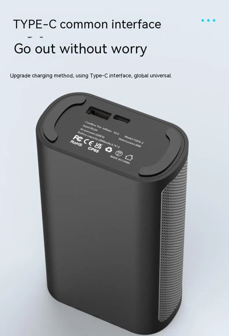 Black handheld wireless digital tyre inflator with LCD screen, showing pressure reading, with accessory nozzles