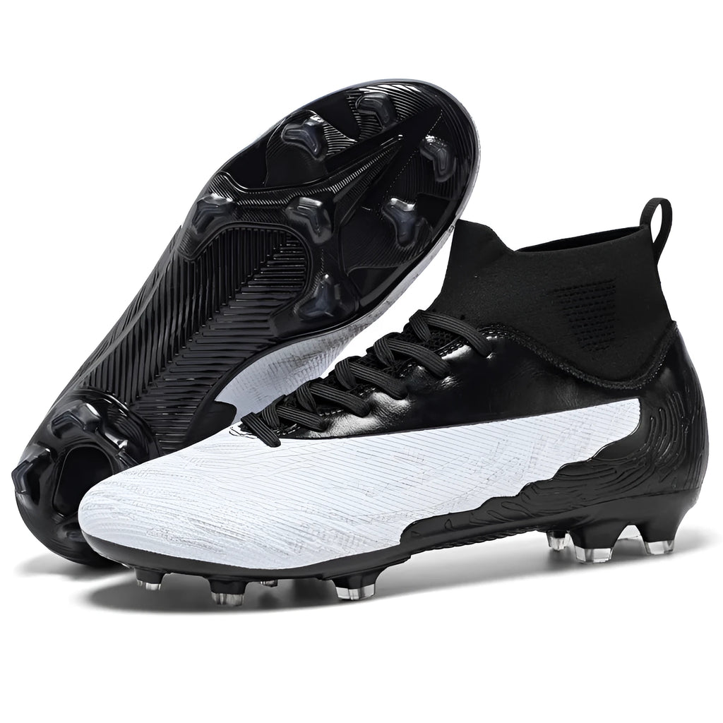 Breathable spike football boots with PVC upper and lace-up closure on grass