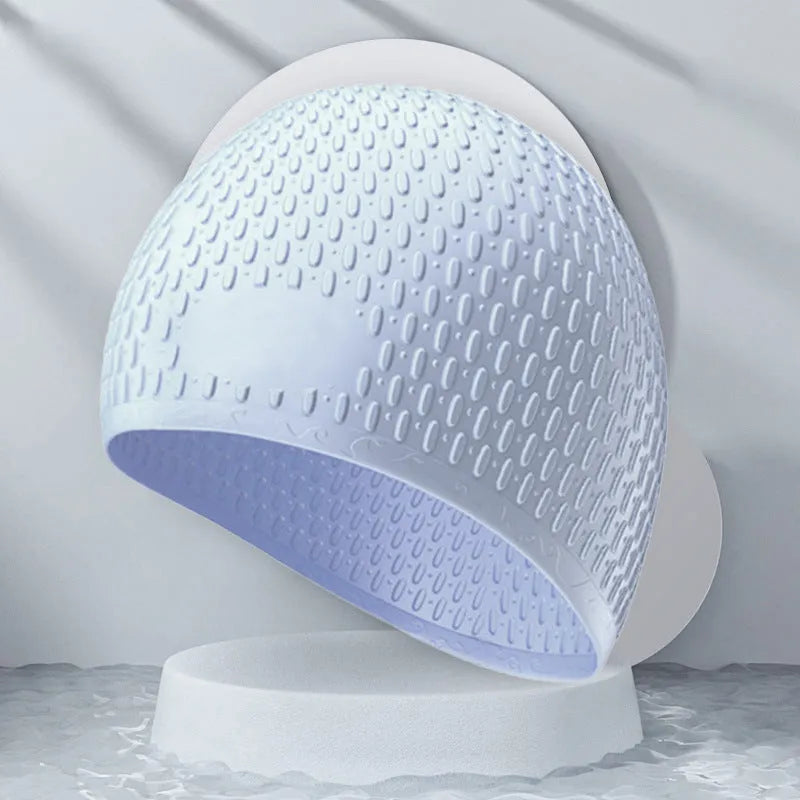 Silicone water drop swimming cap for adults in various solid colours on white background