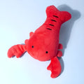Red plush lobster dog toy with squeaker for small and medium dogs