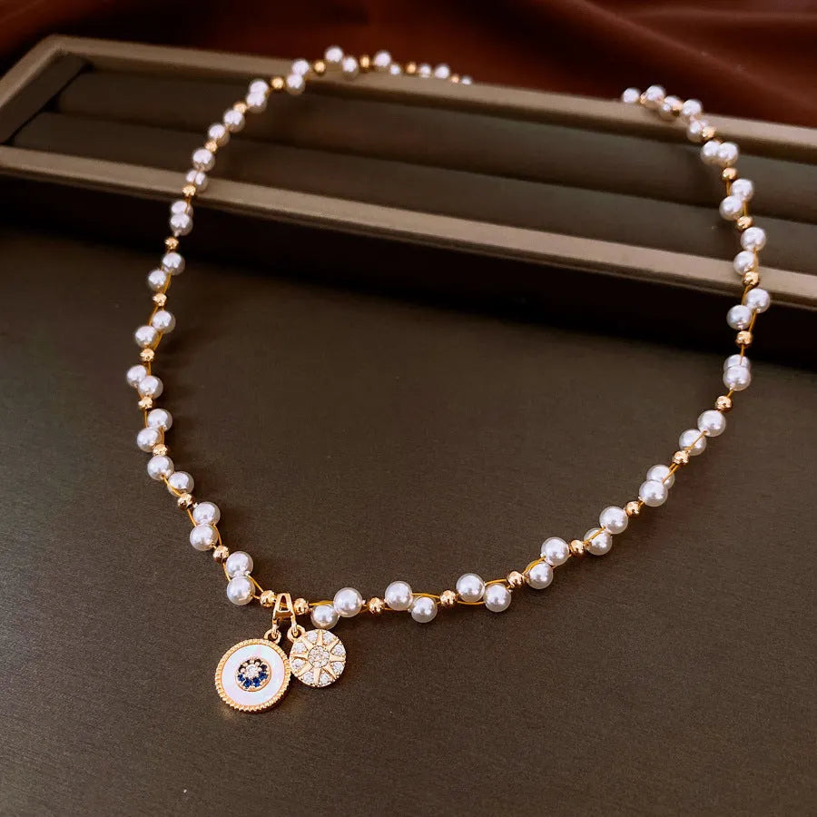 Gold electroplated zircon pearl round pendant necklace with adjustable clavicle chain