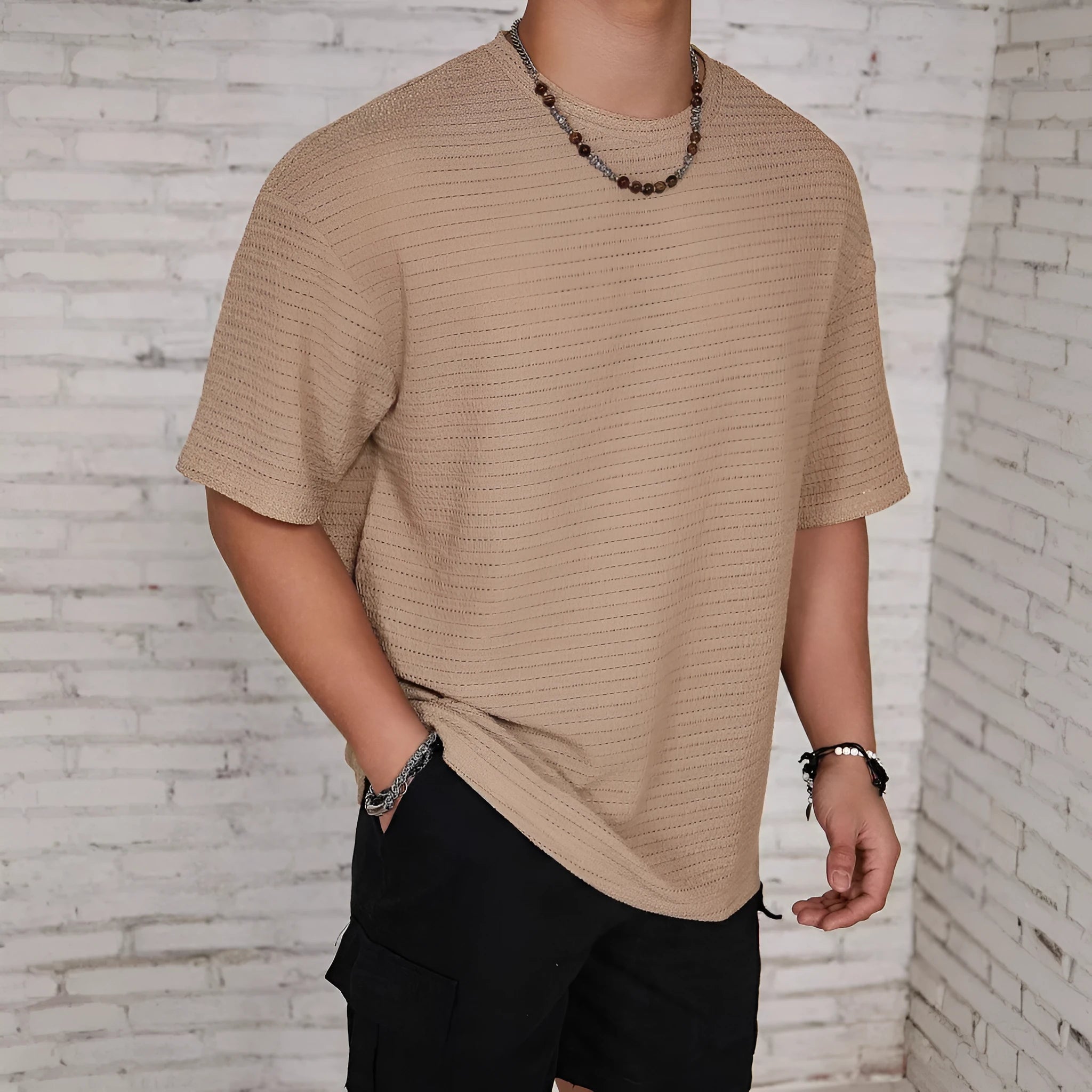 Men's slim fit solid colour short sleeve t-shirt on a hanger.