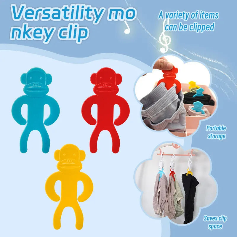 Plastic anti-winding socks clips in blue, red and yellow colours for laundry organisation