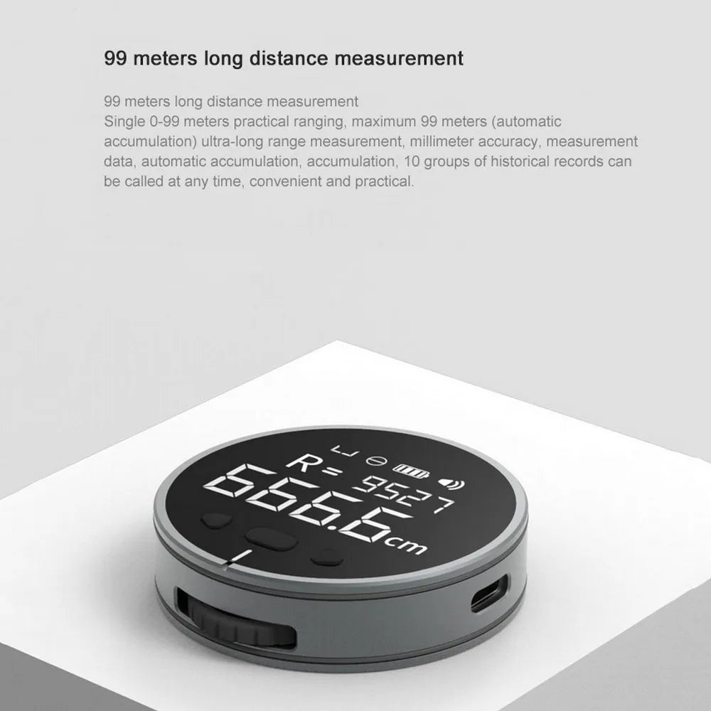 Black digital electronic measuring ruler with 1.8 inch VA LCD display on a flat surface