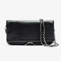 Women's black chain clutch bag with detachable shoulder strap showing interior zipper pocket and gold hardware details