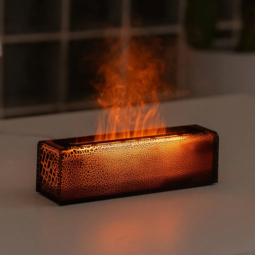 USB lava flame humidifier in black or white with colourful simulated flame and aromatherapy function on a desktop