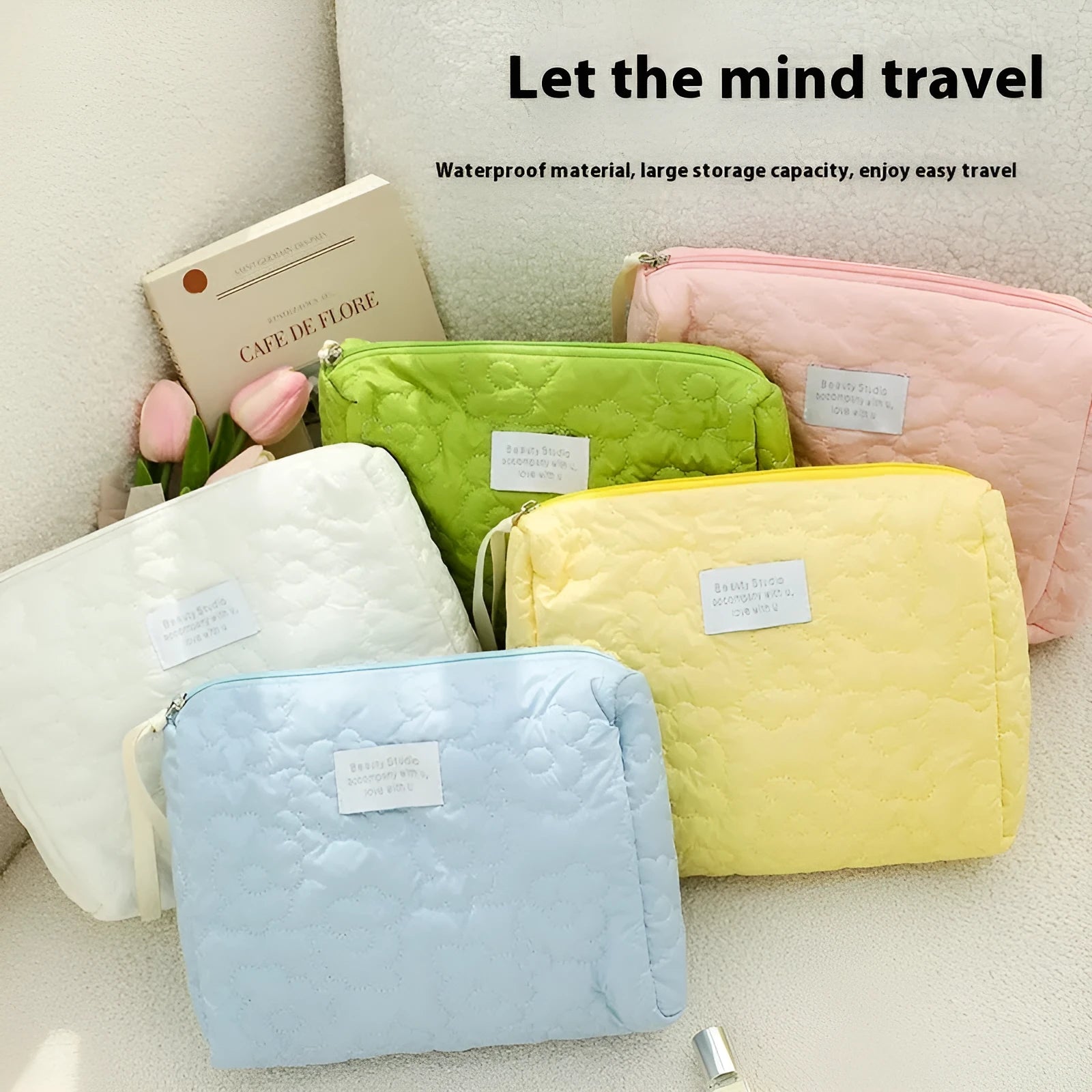 Quilted silk cosmetic storage bag for women in pink, blue, yellow, green, or white.