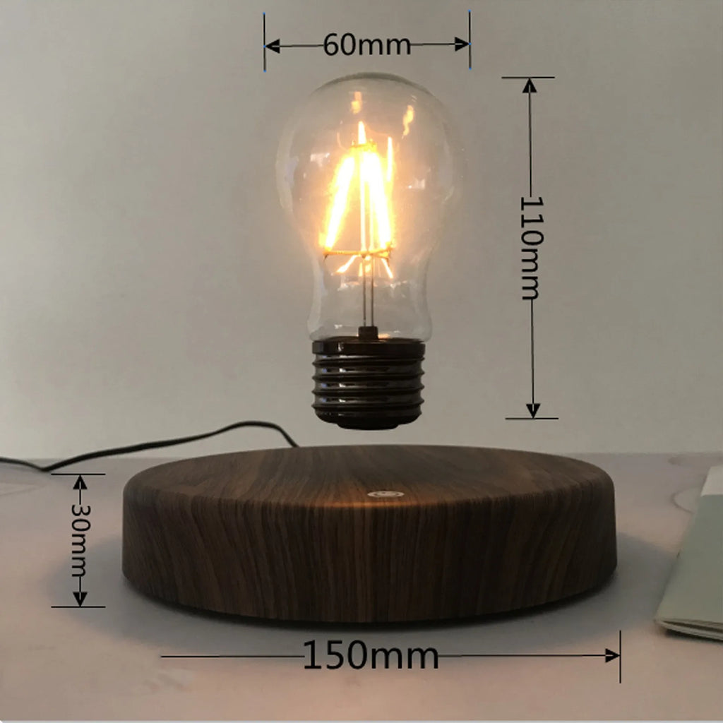 Magnetic levitation desk lamp with floating bulb on a solid wood colour base.