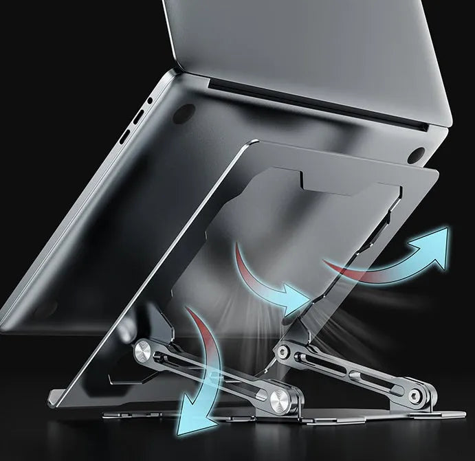 Grey aluminium laptop stand with adjustable angle, folded flat next to a laptop.