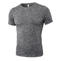 Men's solid colour short-sleeved fitness shirt in quick-drying polyester, shown in multiple colour options.