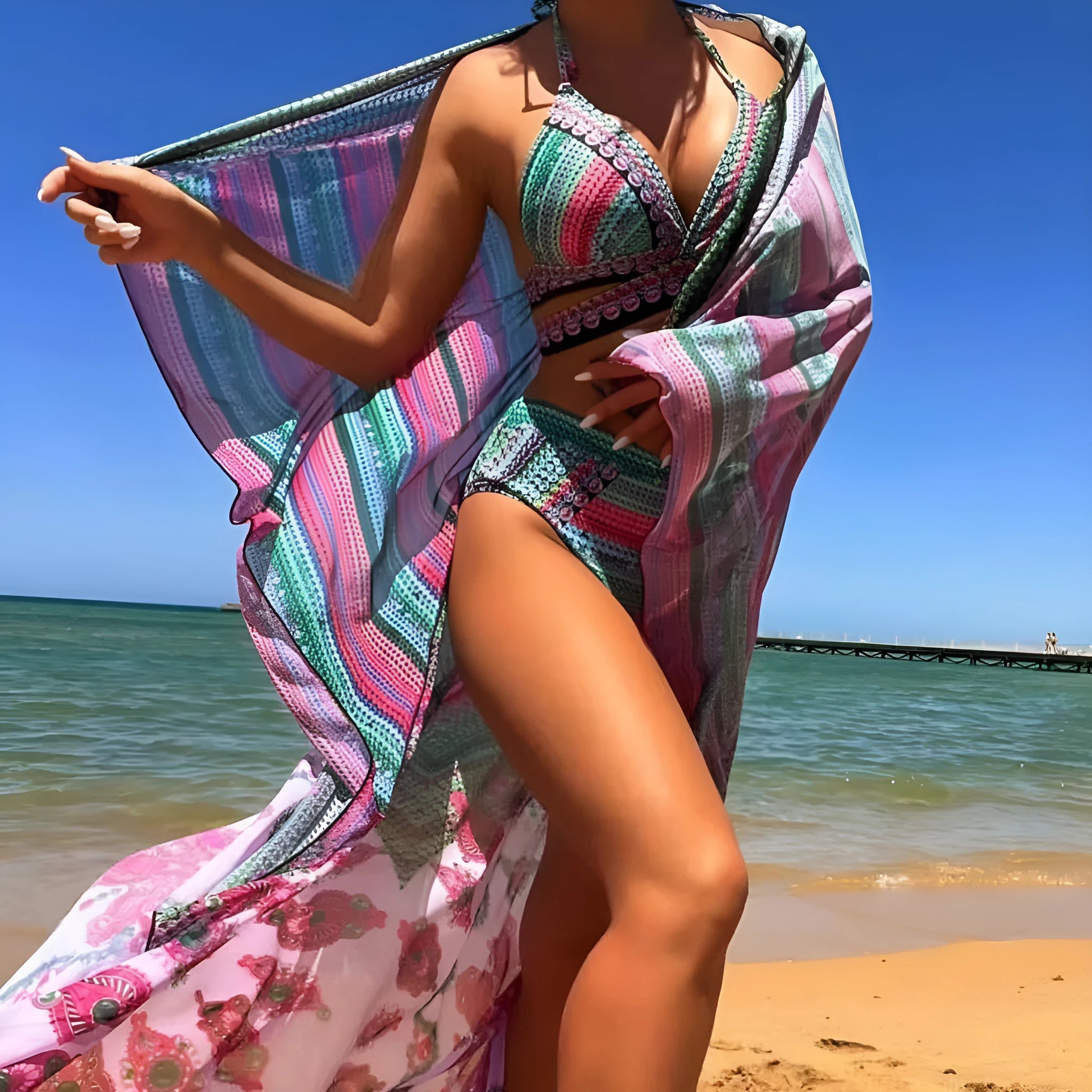 Women's cross bandage bikini set with high waist briefs and sheer veil panels in blue colour