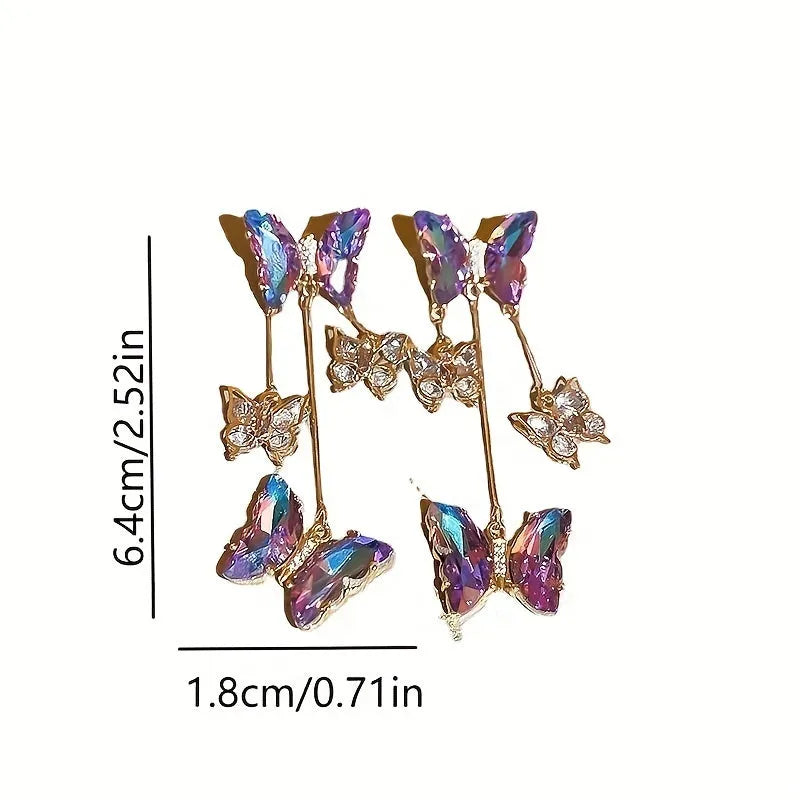 A pair of silver needle-blue purple butterfly tassel earrings with crystal flowers on a 4.5cm drop.