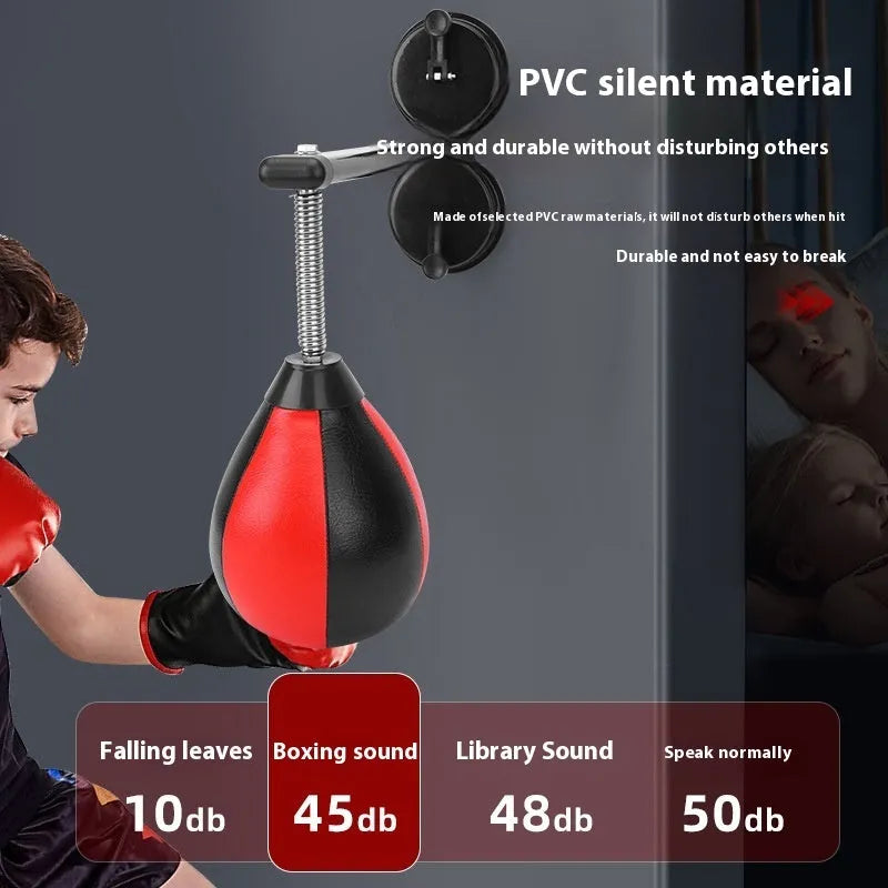 Pear-shaped inflatable punching ball with red and black design mounted with suction cups for boxing training
