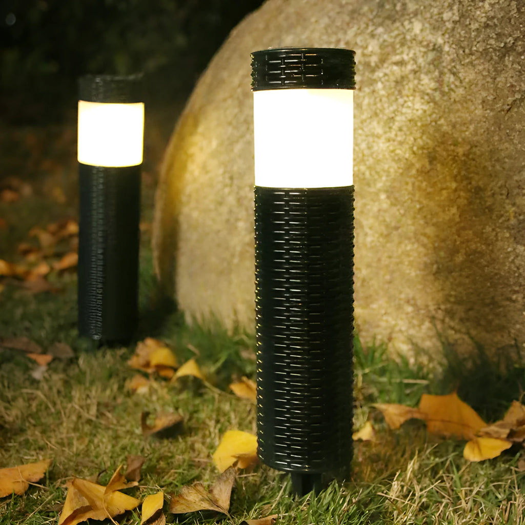 Modern abstract solar-powered outdoor garden light with waterproof casing.