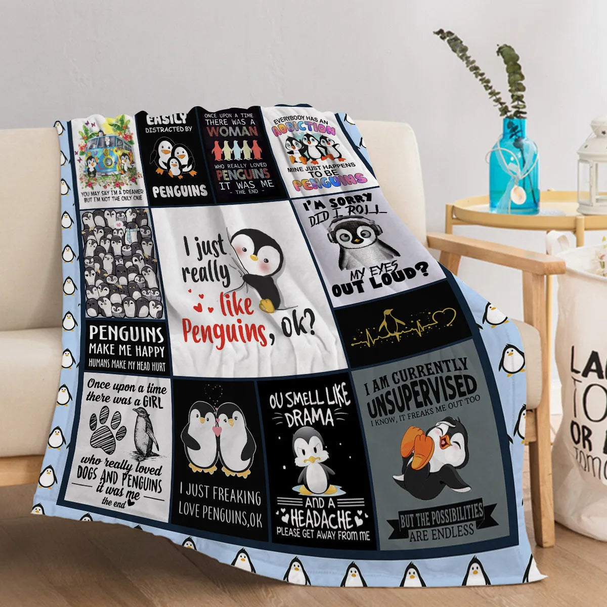 Multicoloured flannel throw blanket with penguin patterns, 130x150cm size on a sofa