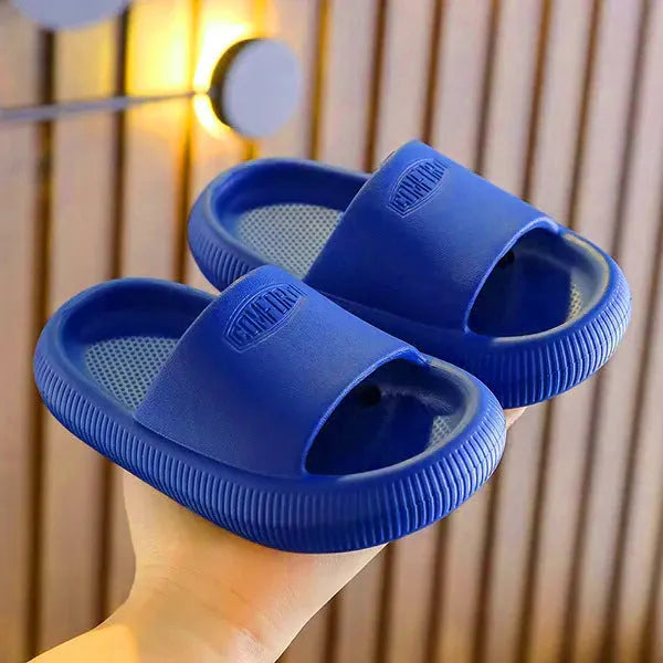 Children's colourful EVA slippers with a textured non-slip sole, shown in a mixed colour selection.