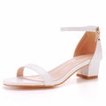 Women's white PU one-strap round toe block heel sandals with buckle fastening