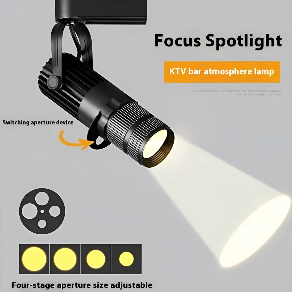 Black surface-mounted LED spotlight with aluminium shell for commercial restaurant lighting.