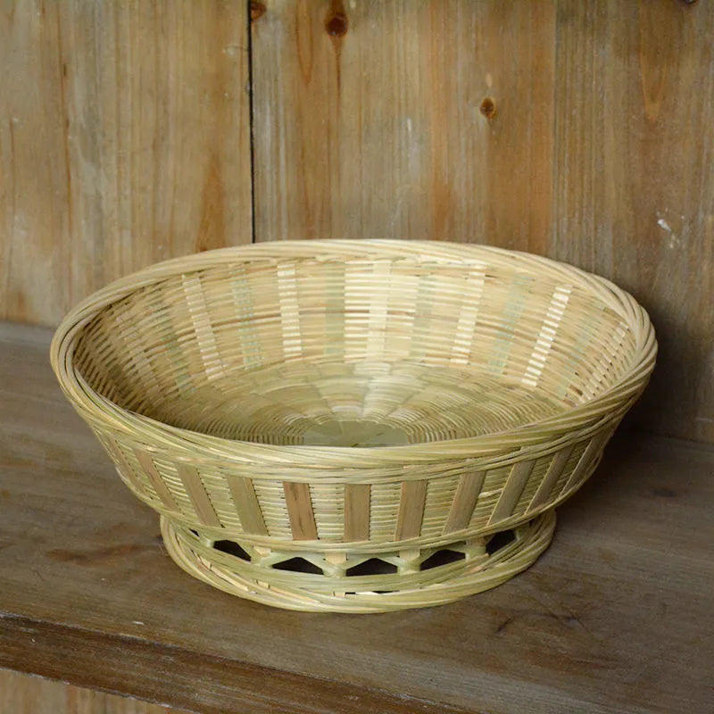 Handmade natural bamboo storage basket with open weave design in three size variations