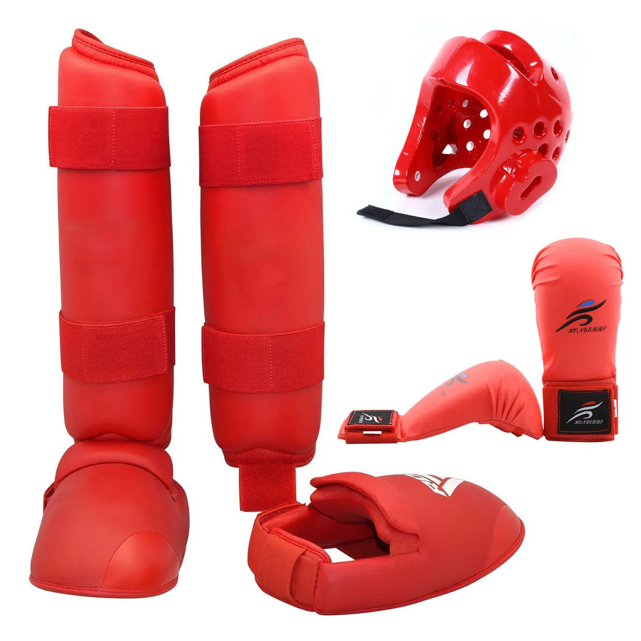 Red and blue karate protective gear set with helmet, boxing gloves and leg guards on training mat