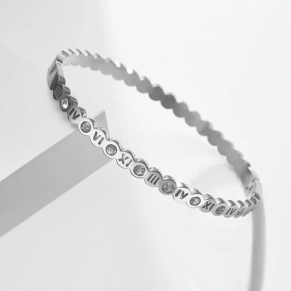 Korean style titanium steel bracelet with numeric elements in gold, rose gold, and steel colour options