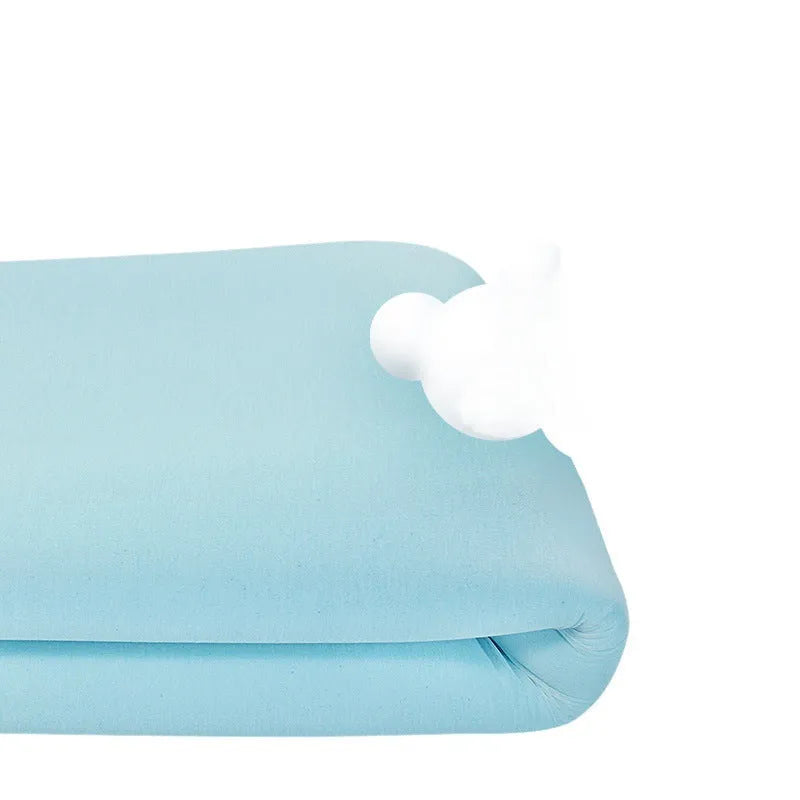 Thin gel memory cotton tatami mattress on a floor, showing its slim profile and textured cover.