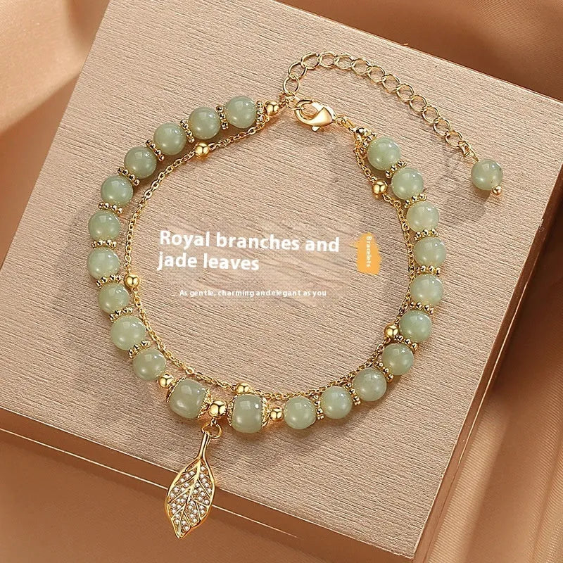 Chinese style glass bracelet with bamboo joint design elements in multiple colour options