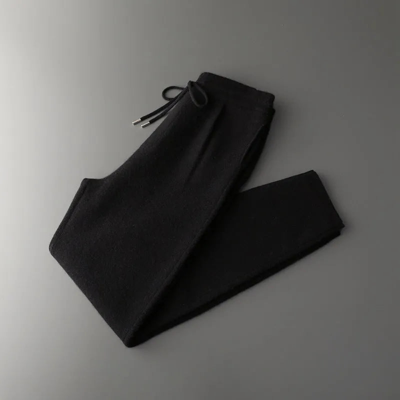 Men's loose cashmere trousers in light camel colour; winter casual wear with elastic waist