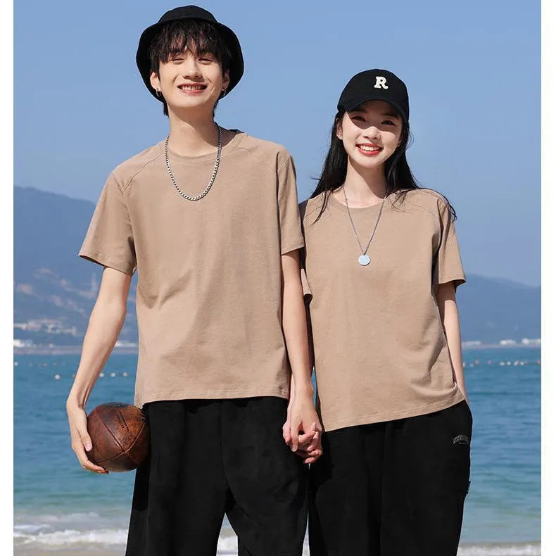 A man's pure cotton solid colour short sleeve T-shirt laid flat, showing its straight cut.