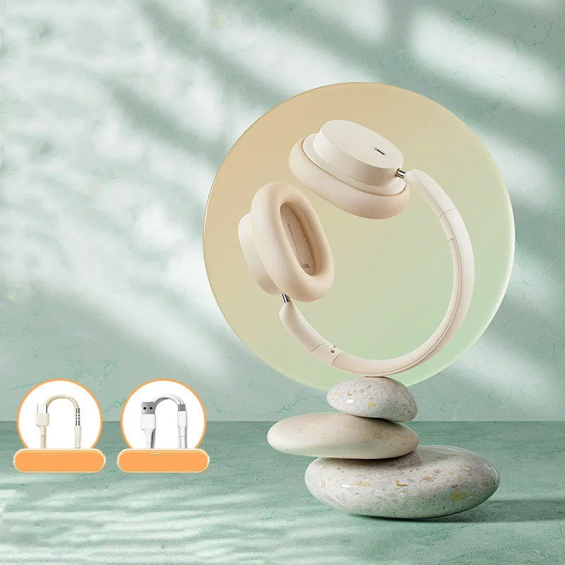 Beige and grey Bluetooth over-ear headphones with head-mounted design showing earcups and adjustable headband