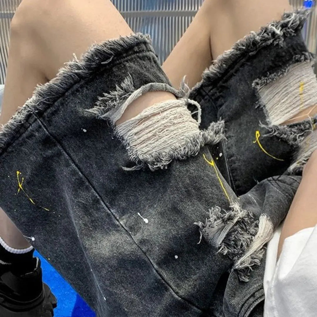 Men's black water washed hole denim shorts with loose fit and casual street style