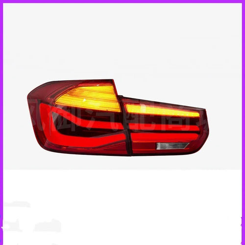 BMW 3 Series modified LED tail light assembly in red or black smoke finish, showing streamer running light design.