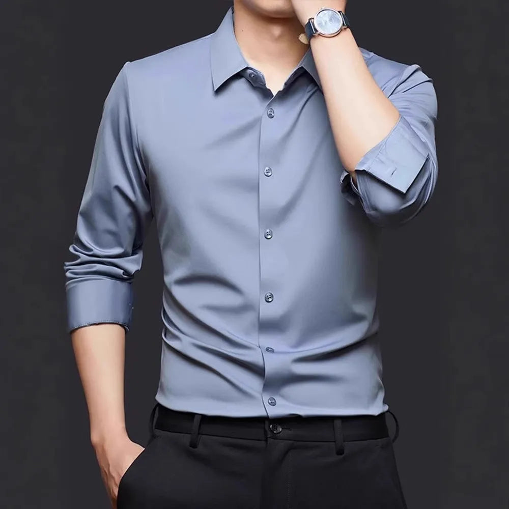 Man wearing a seamless long sleeve elastic shirt in a cardigan style, showing its fit and texture.