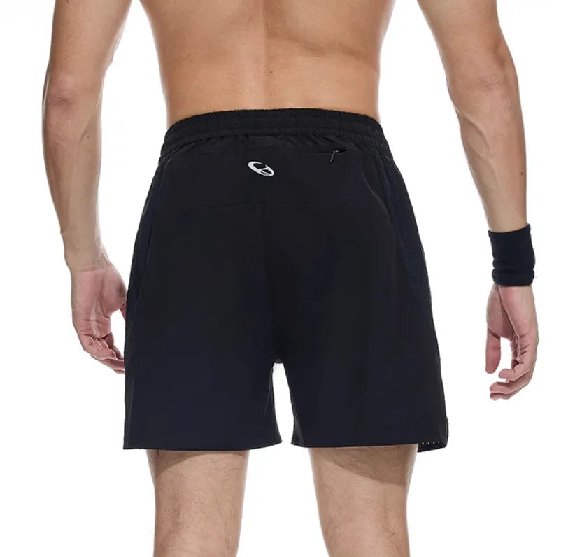 Black running shorts with laser-punched stitching on a manikin, showing stretch fabric for training.