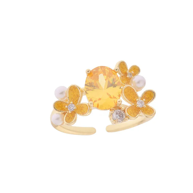 Women's flower pearl zircon open ring showing adjustable opening and electroplated metal construction