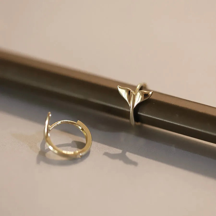 Sterling silver fishtail earrings with gold plating showing 8mm hoop size