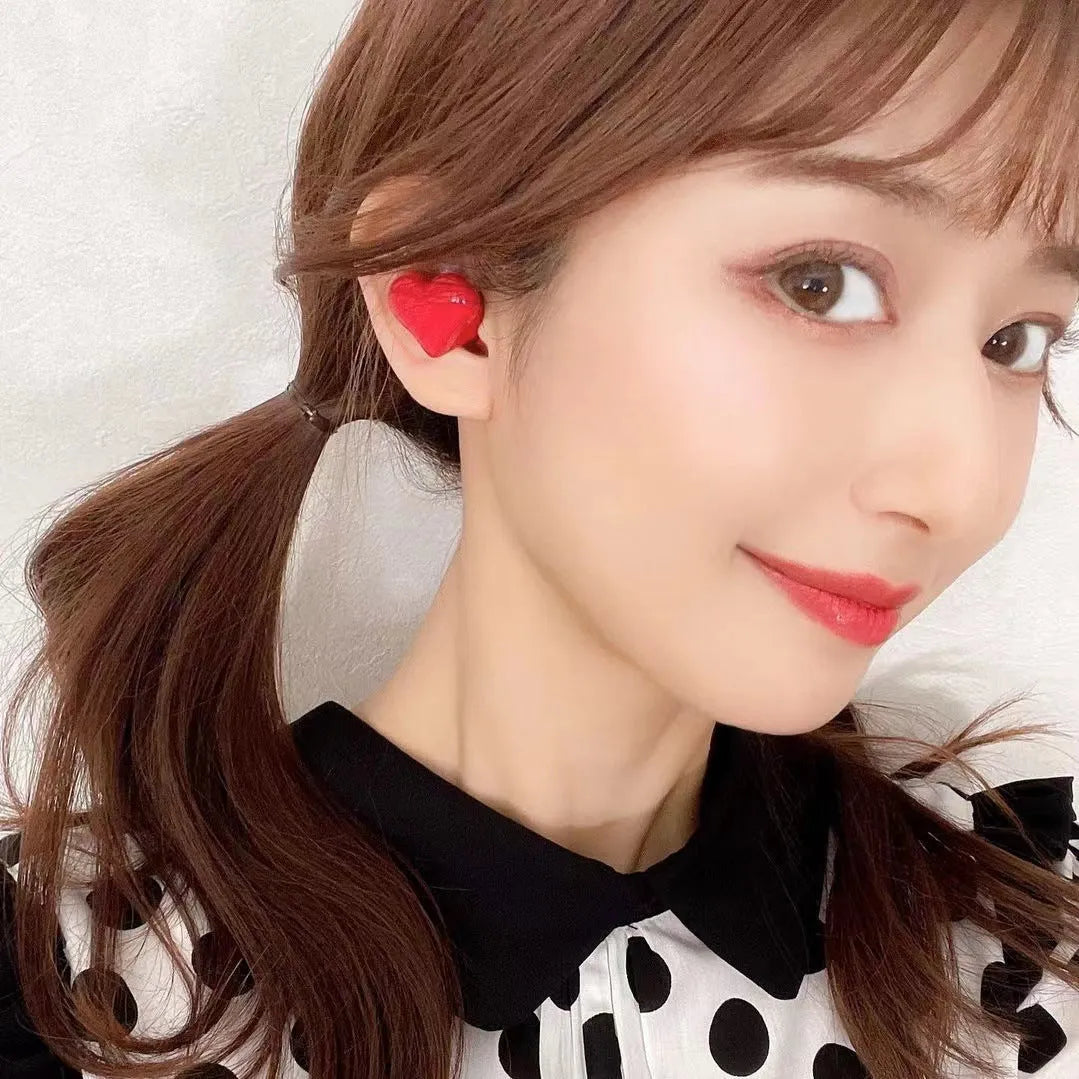 Heart-shaped wireless Bluetooth headphones in Chinese red colour with in-ear design
