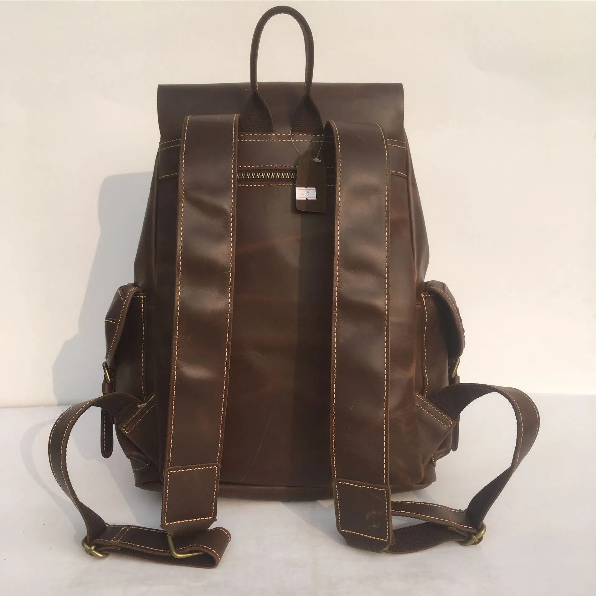 Brown men's genuine leather backpack with air pillow belt system and first layer cowhide construction
