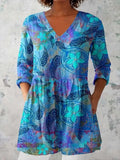 Women's slim fit retro patterned long-sleeved top in a polyester fabric, shown in one of twelve available colourways.