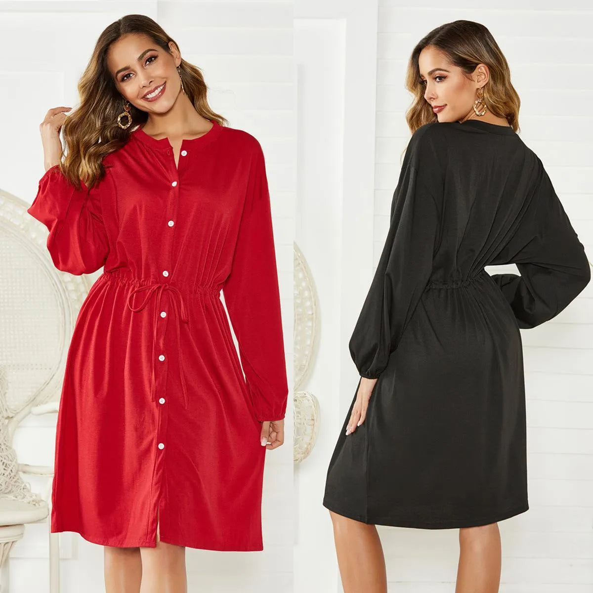 Black mid-length A-line dress with long sleeves and an elastic cinched waist with a loose belt.