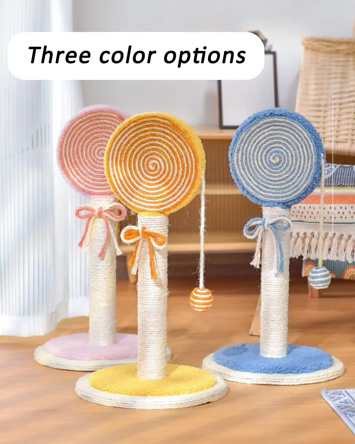 Blue cat scratching post with a hanging toy ball on a sturdy square base.