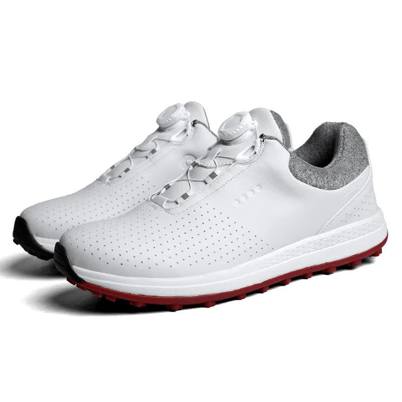 Men's low-top white casual golf sneakers with breathable upper and non-slip rubber sole on grass