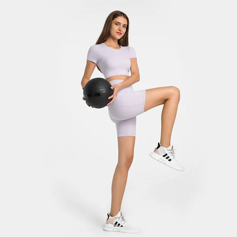 Women's tight-fitting super stretch sports shorts in grey lake green, short length for running.