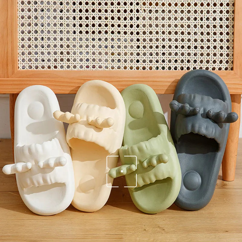 Deer horn design EVA flip flop slippers in light yellow on a non-slip sole.