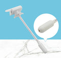 Manual blue and white handle beverage pump with long silicone straws for transferring milk and juice.