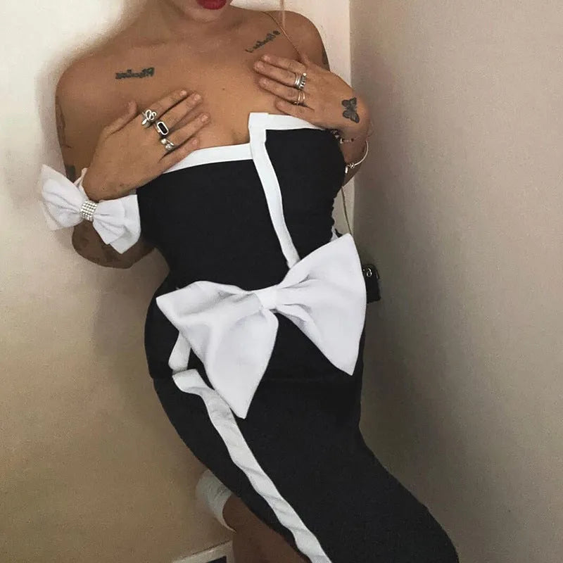 Black and white colour-blocking women's swimsuit with bow detail and irregular tube top