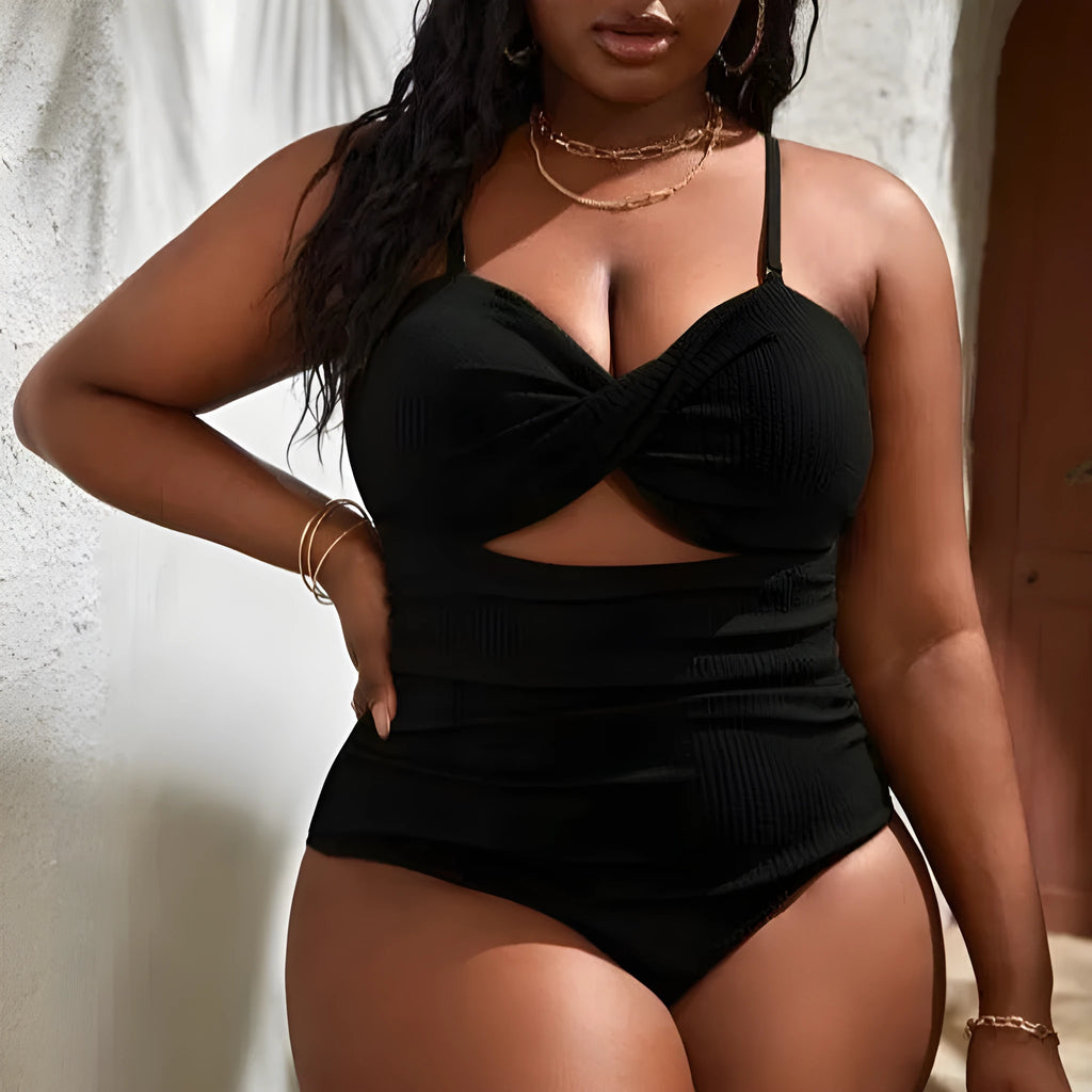 Plus size women's black slimming one-piece swimsuit with triangle sling and sleeveless design, sizes S-5XL