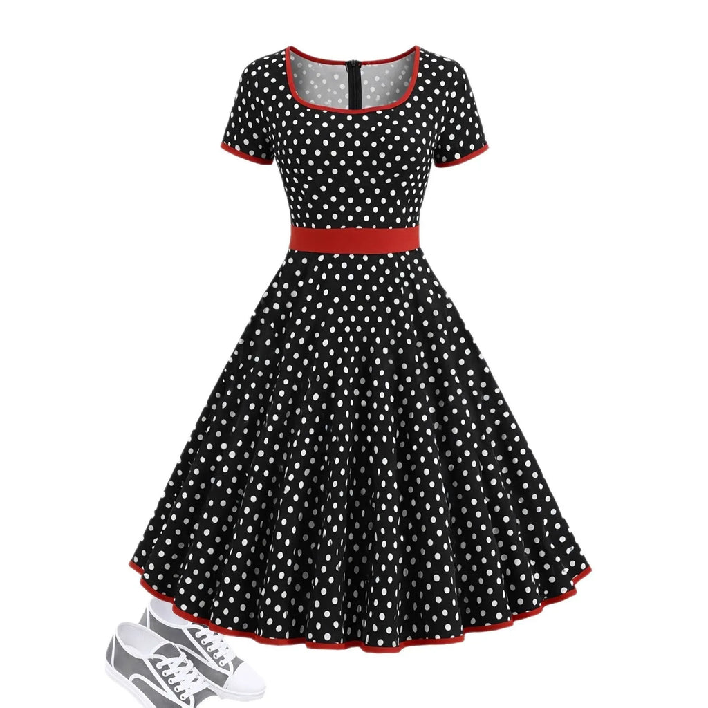Multicolour polka dot dress with a square neckline, short sleeves, front zipper, and a pleated midi skirt on a hanger.
