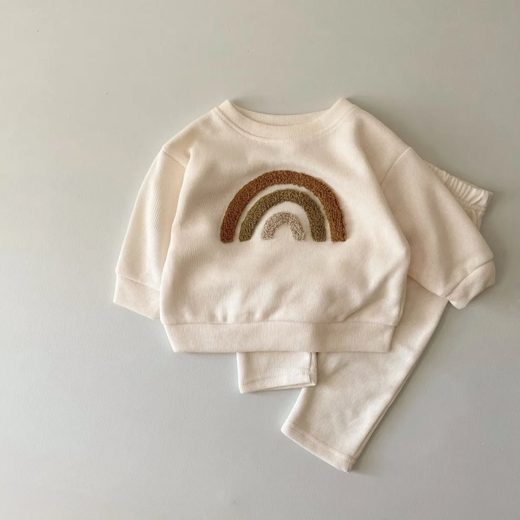 Creamy-white baby cotton two-piece suit with alphabet embroidery on long sleeve blouse and matching trousers