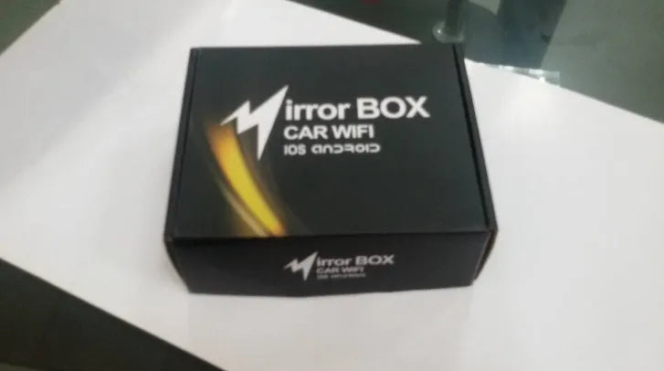 Black car mirror link box converter unit with antenna, power cable, and AV cable for wireless smartphone screen mirroring.
